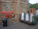 Milk urns, buckets and an old post box