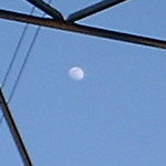 Chingford, UK: Moon viewed through pylon ZBH8 in carpark of Sainsbury's, Low Hall [Picture by Flash Wilson]