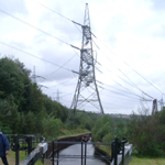 UK: Huddersfield Narrow Canal, passing under a pylon near Staleybridge [Picture by Howard Fisher]