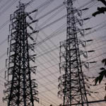 Japan: Tall multi crossbar towers near Tamade [Picture by Graeme MacDonald]