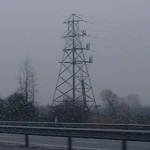 M5, UK: End pylon - cables stop before the motorway [Picture by Flash Wilson]