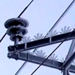 Ice forms on a pylon near Carmen, Manitoba, Canada. [Picture by Bill Grassick, Winnepeg, Manitoba]