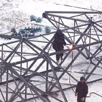 Soldiers clear and repair pylons after the Canadian ice storm of 1998. [Photo courtesy of DND/CF - Photographer (Retired) - Cpl. Sullivan]